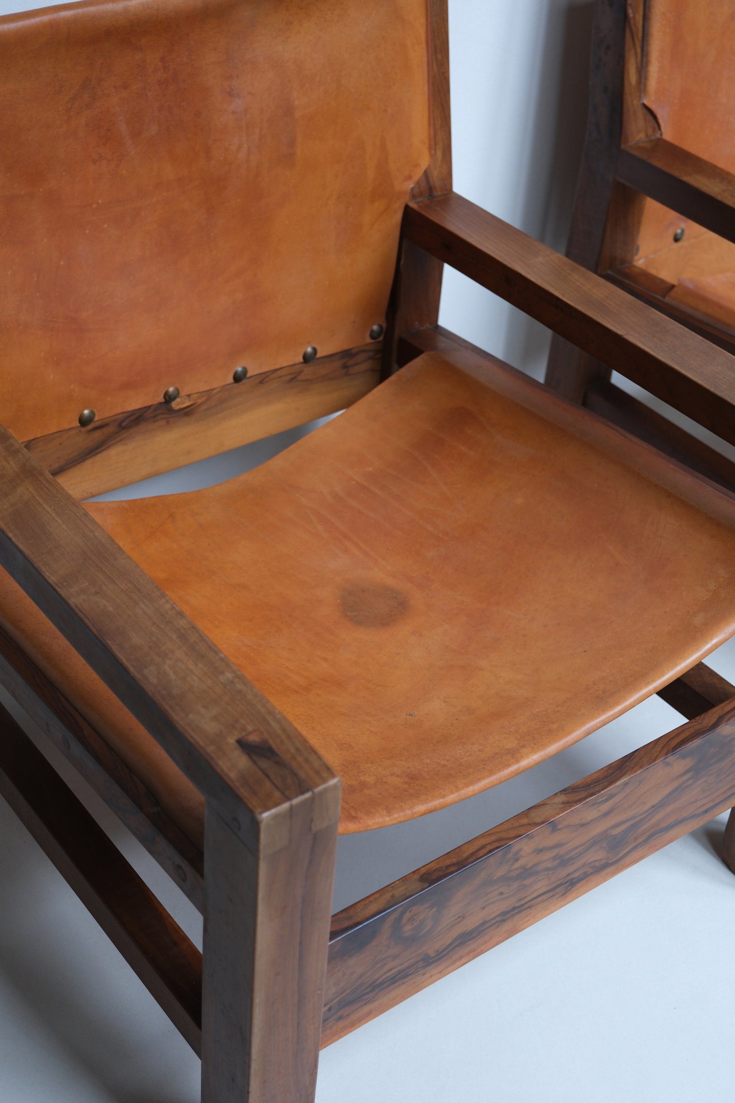 Set of armchairs in cognac leather and olive wood, France, 1970s